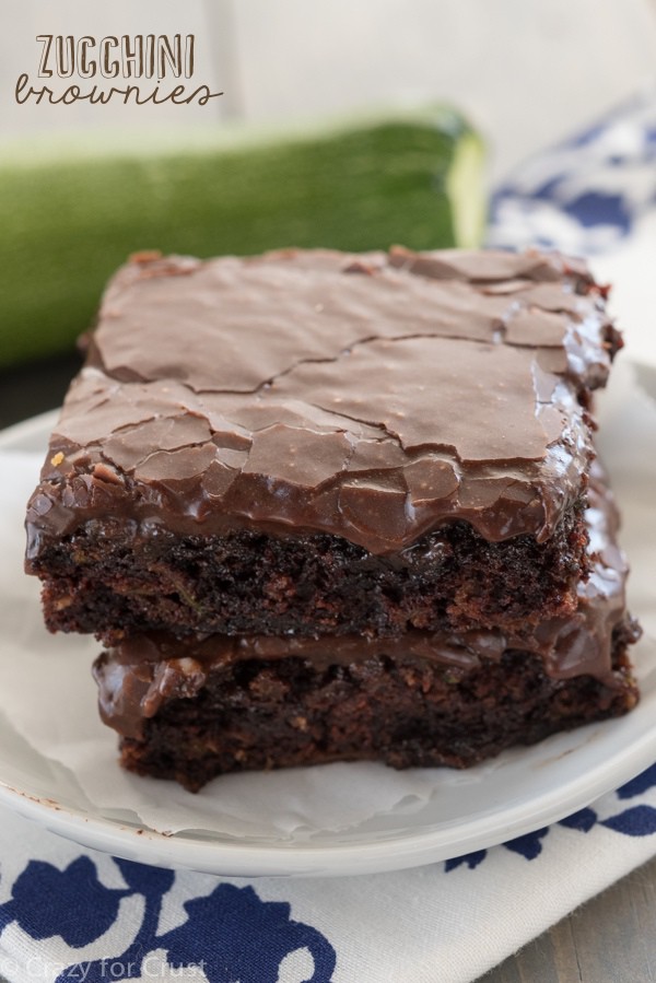 Zucchini Brownies - the easiest recipe for the most gooey, chocolaty, fudgy brownies full of zucchini! And NO ONE will guess!
