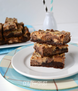 Brownie Peanut Butter Magic Bars by www.crazyforcrust | A brownie crust topped with Reese's Peanut Butter Cups!
