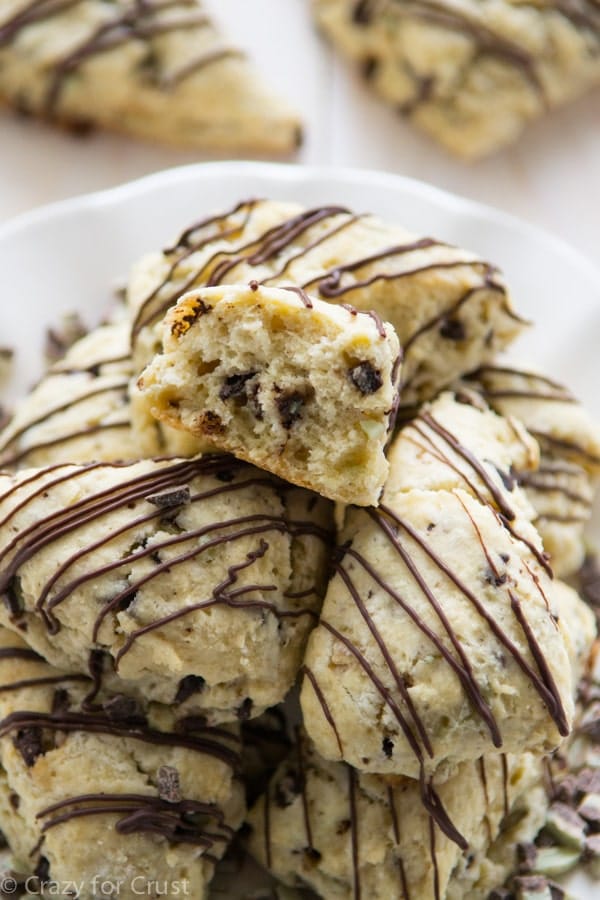 The perfect Mint Chip Scones! This recipe produces soft and pillowy scones, filled with mint chip pieces and chocolate!
