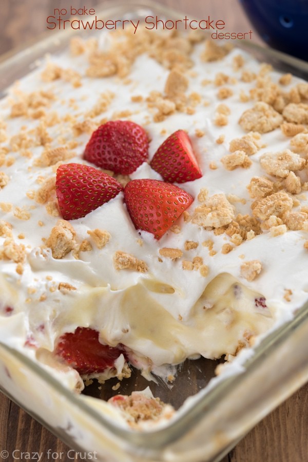 Easy No-Bake Strawberry Shortcake Dessert with layers of pudding and whipped cream, strawberries and crushed cookies. The perfect strawberry recipe for summer!