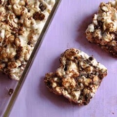 overhead shot of popcorn cereal treats on purple background