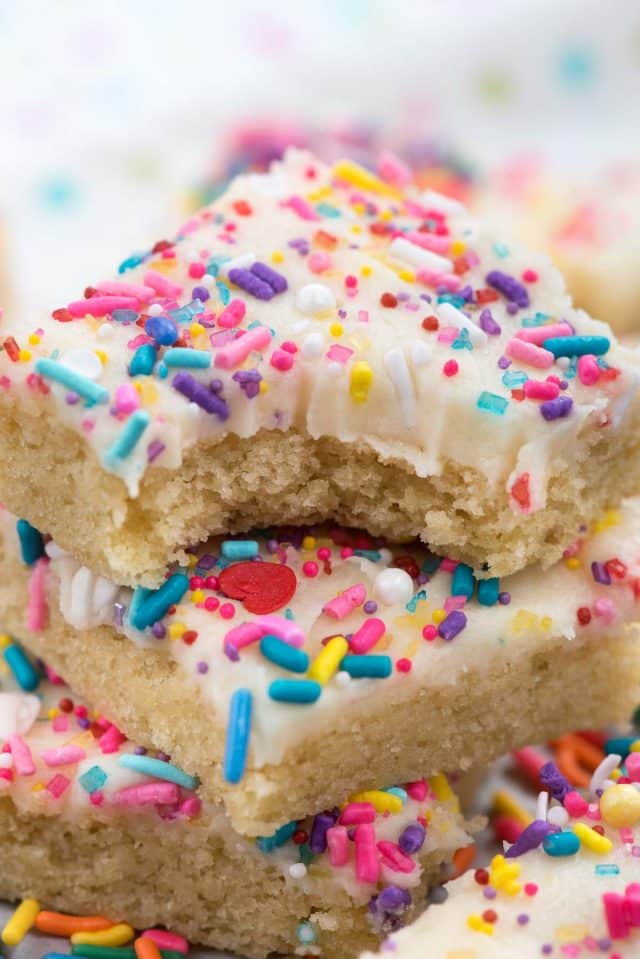 stack of sugar cookie bars with bite taken out