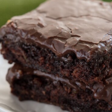Zucchini brownies are a healthier recipe for brownies, and these are the BEST zucchini brownies ever! They're ooey, gooey, and SUPER fudgy brownies. And NO one will know they have zucchini inside!