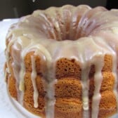 Pumpkin Bundt Cake with Browned Butter Frosting on white linen