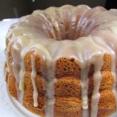 Pumpkin Bundt Cake with Browned Butter Frosting on white linen