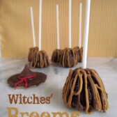 brownie bites with sticks decorated to look like witches brooms