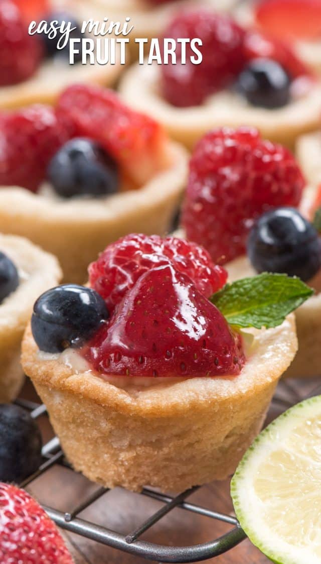 close up of mini fruit tart with berries