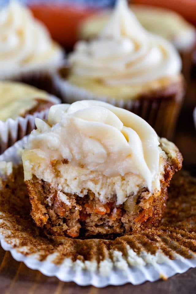 carrot cake cheesecake cupcake with bite missing