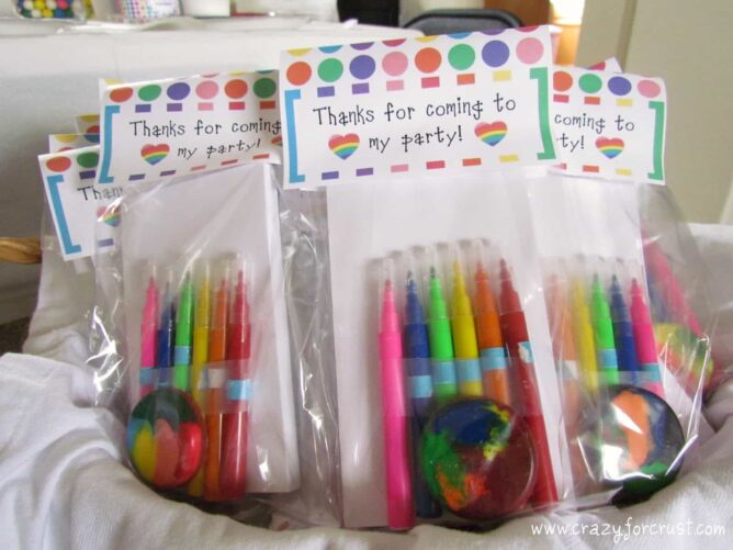 rainbow birthday party favors - crayons and rainbow pens