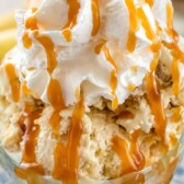 ice cream in dish with caramel and whipped cream