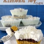 almond joy cup on white napkin with fork and bite missing
