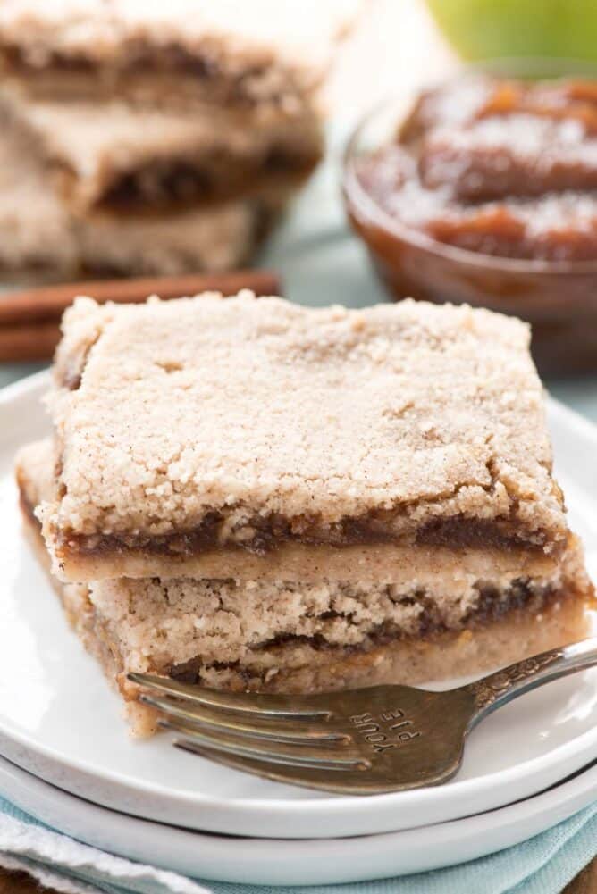 Apple Butter Pie Bars in a stack of two on white plate with fork