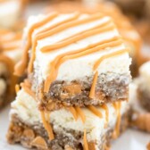 Oatmeal Scotchie Cheesecake Bars are cheesecake bars with an oatmeal cookie crust! Everyone loves these - they're a hit!