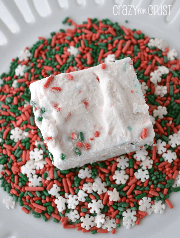 funfetti marshmallows with christmas sprinkles on white platter 