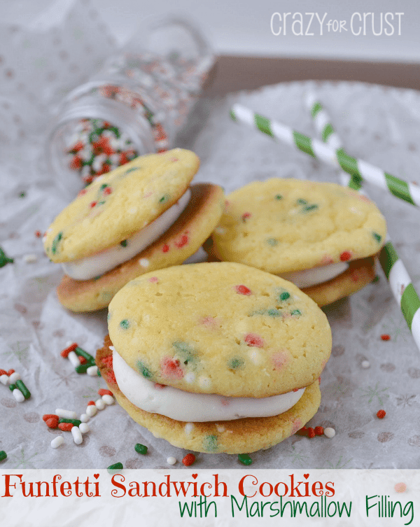 Funfetti Sandwich Cookies with Marshmallow on parchment paper with title