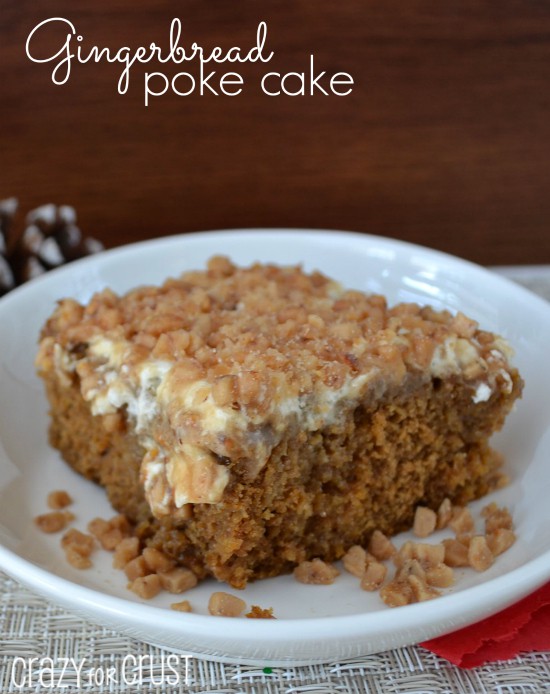 Gingerbread Poke Cake square on a white plate with title