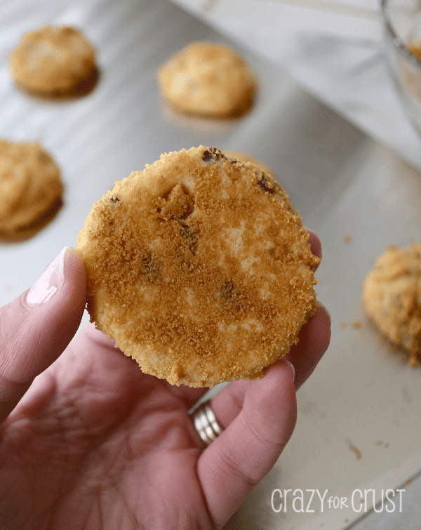 nutter butter cheesecake cookies being held by hand