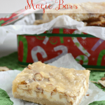 Almond white chocolate magic bars in a christmas tin, with graphic title on the top.