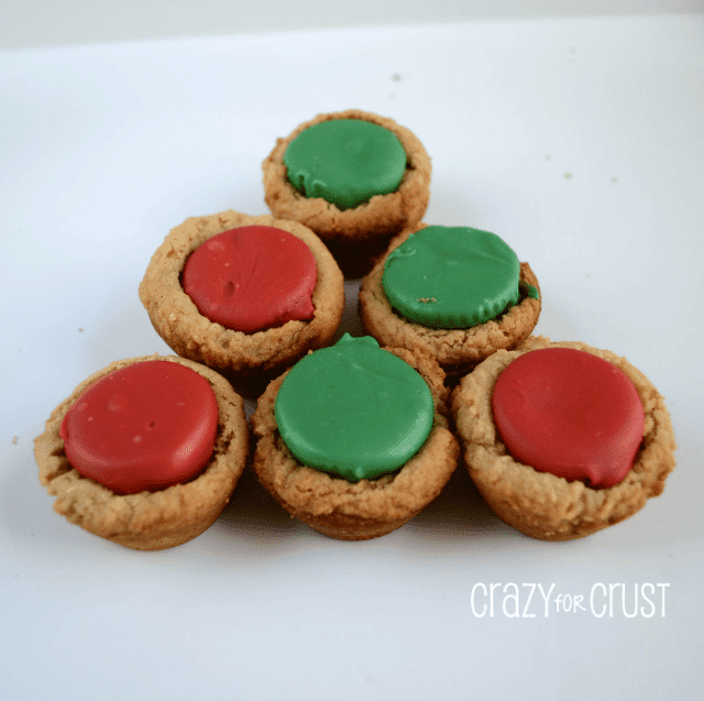 cookie cups with christmas colored candy in the center