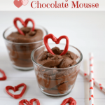 Heart healthy chocolate mouse in a clear glass with a red heart on top, graphic title on the top.