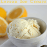 easy skinny lemon ice cream in white bowl on white napkin with lemons