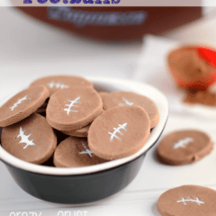 chocolate football conversation hearts on white background and bowl with coco powder and football