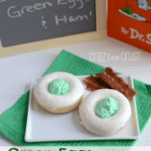 green eggs donuts on white plate