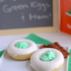 green eggs donuts on white plate