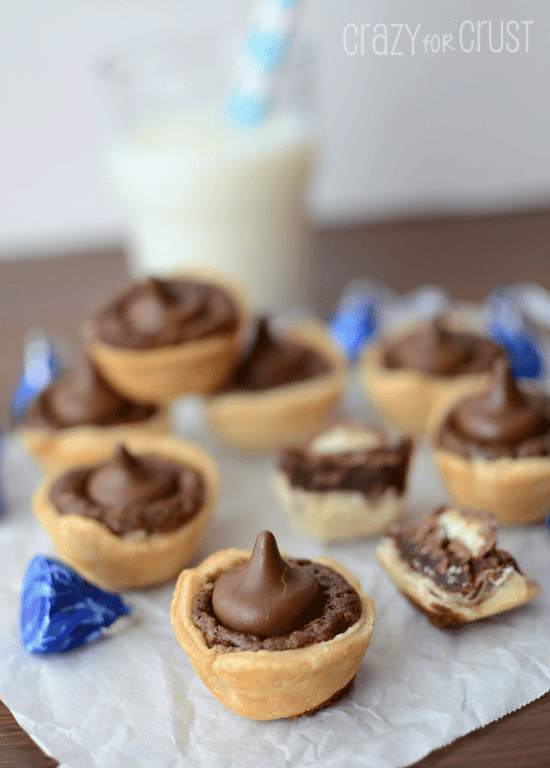 coconut kiss brownie pies on parchment paper