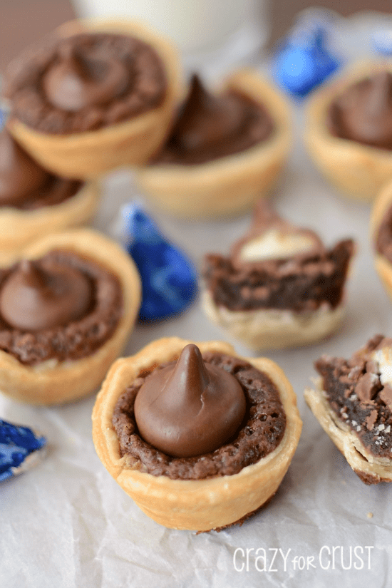 coconut kiss brownie pies on parchment paper