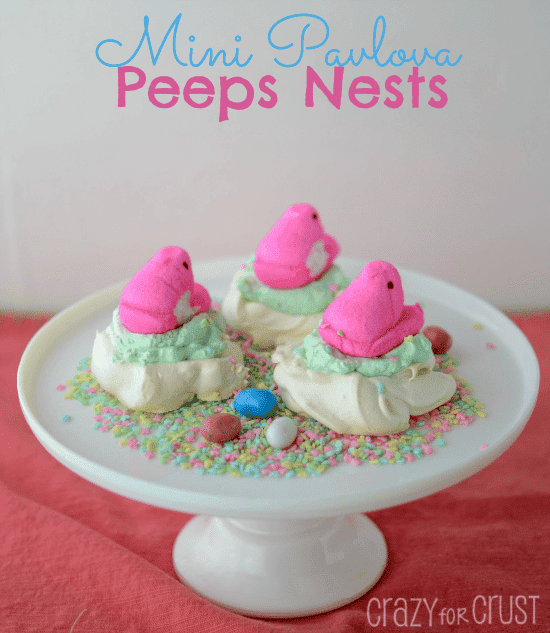 peeps nests meringue cookies with peep on top on white cake platter