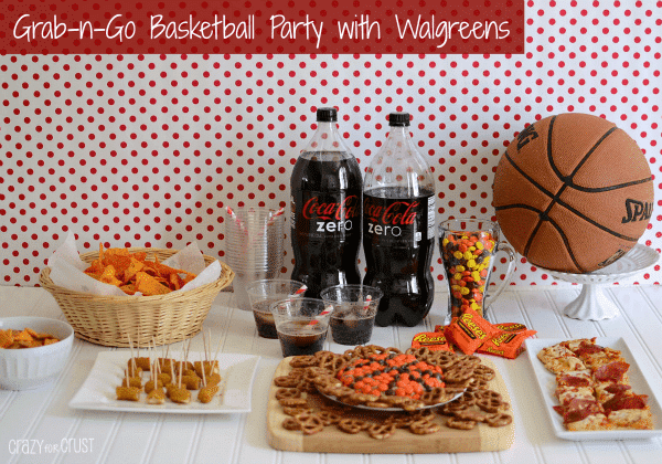 Basketball themed table setting with snacks, Reese's basketball dip, Coke Zero and a basketball on a cake stand