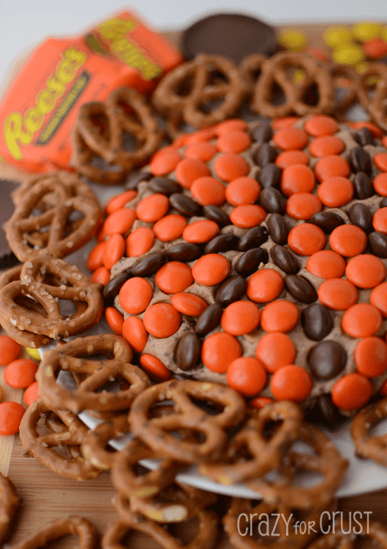 Close up shot of Reese's basketball dip with pretzels for dipping