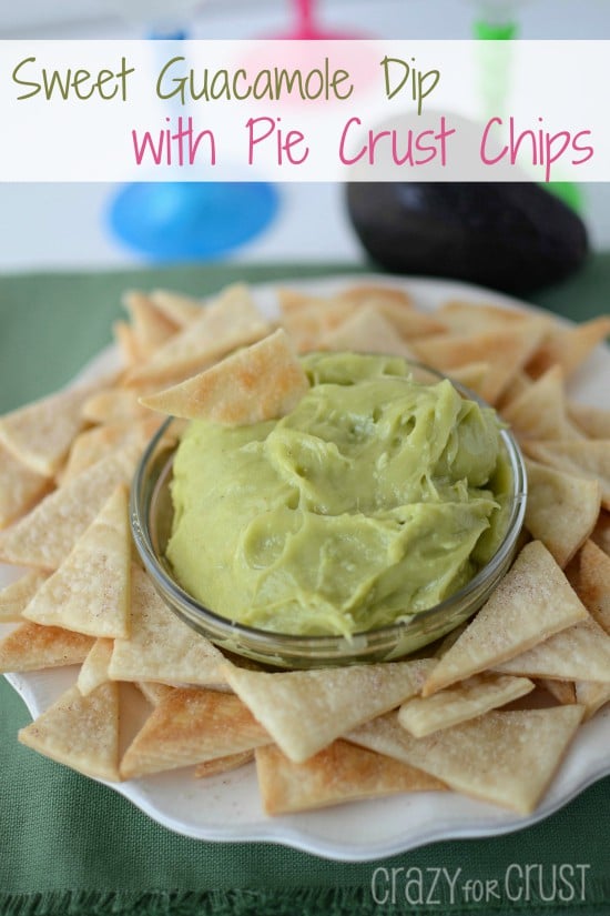 Sweet Guacamole Dip in a glass bowl with Pie Crust Tortilla Chips around it on a serving plate with recipe title on top of image