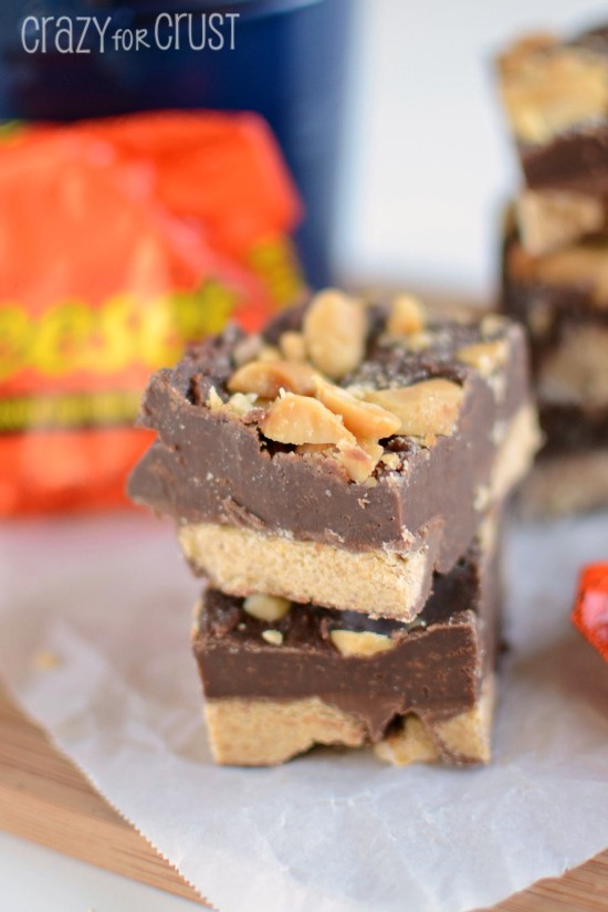 Close up photo of two Reese's Fudge pieces stacked ontop of eachother