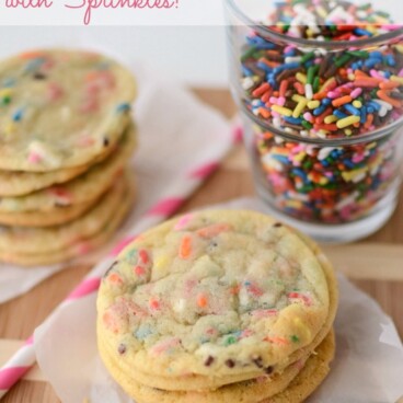 Thin Sugar Cookies in a stack on parchment paper
