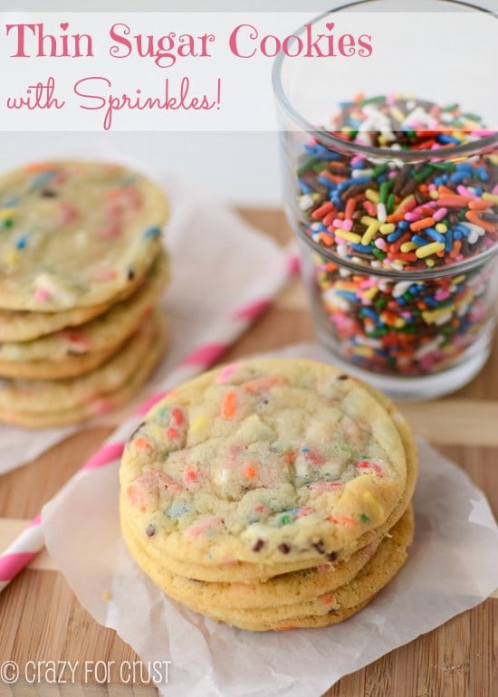 Thin Sugar Cookies in a stack on parchment paper