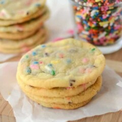 stack of thin-sugar-cookies with sprinklesd