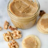 maple walnut butter in jar with walnuts and pie crust chips and words on photo