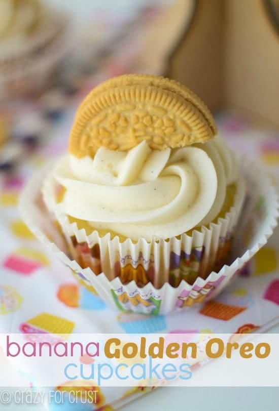 Banana Golden Oreo Cupcakes with frosting and half a golden oreo on top