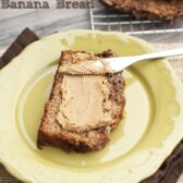 slice of banana bread on yellow plate smeared with peanut butter