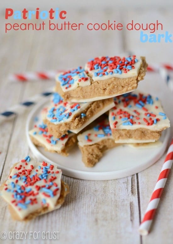 Patriotic Peanut Butter Cookie Dough Bark on a wooden board with title