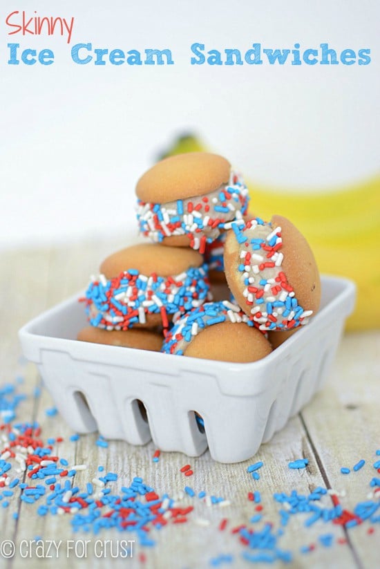 ice cream sandwiches made with small cookies and sprinkles in a stack in a basket