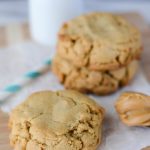 large peanut butter cookies on parchment paper