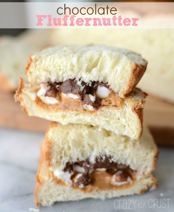 sandwich with peanut butter and chocolate and marshmallows sliced in a stack