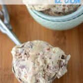 coffee ice cream with nutella in ice cream scoop on cutting board