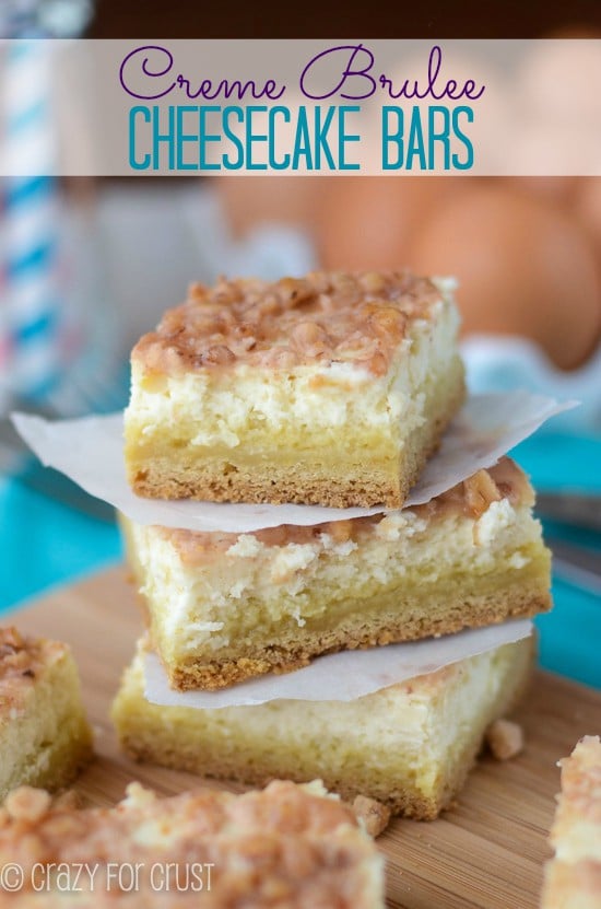 creme-brulee-cheesecake-bars stack on cutting board with title