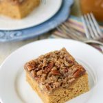 slice of pumpkin coffee cake on white plate