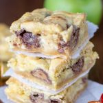 stack of gooey bars with rolos and apples