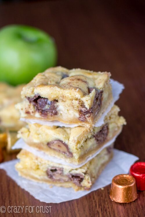 Stack of Cake mix bars on parchment paper